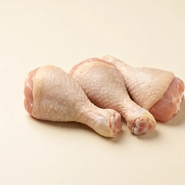 Coxas com sobrecoxa de frango cruas, com osso